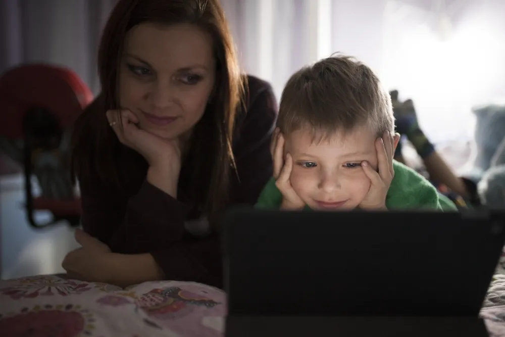 mother-son-watching-movie-tablet